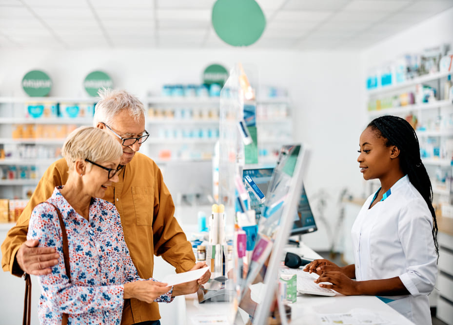 Pharmacist helping customers